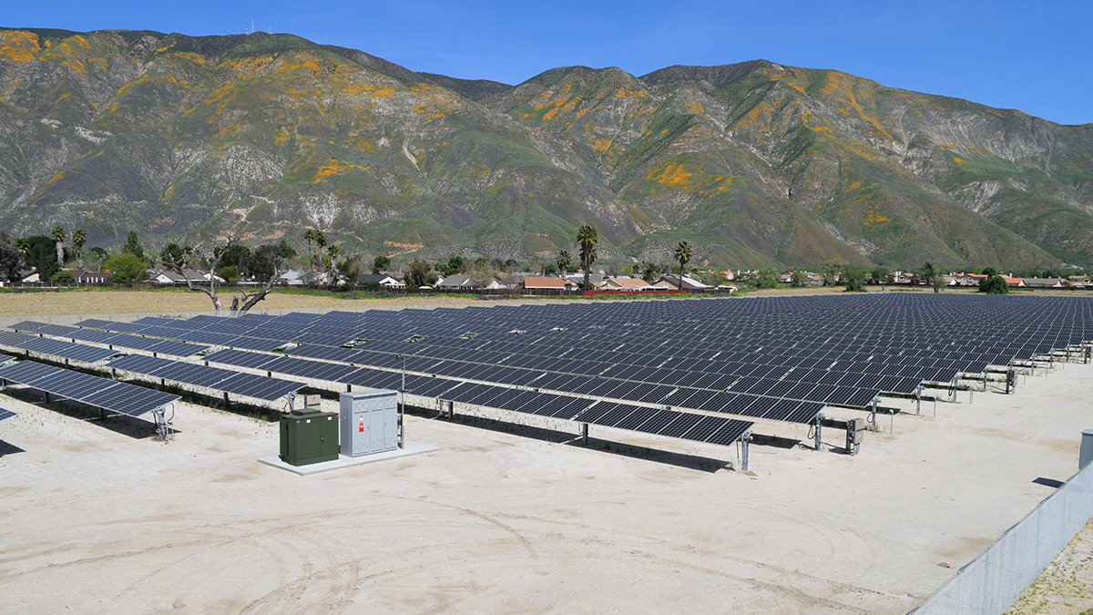 solar field with hills in the background