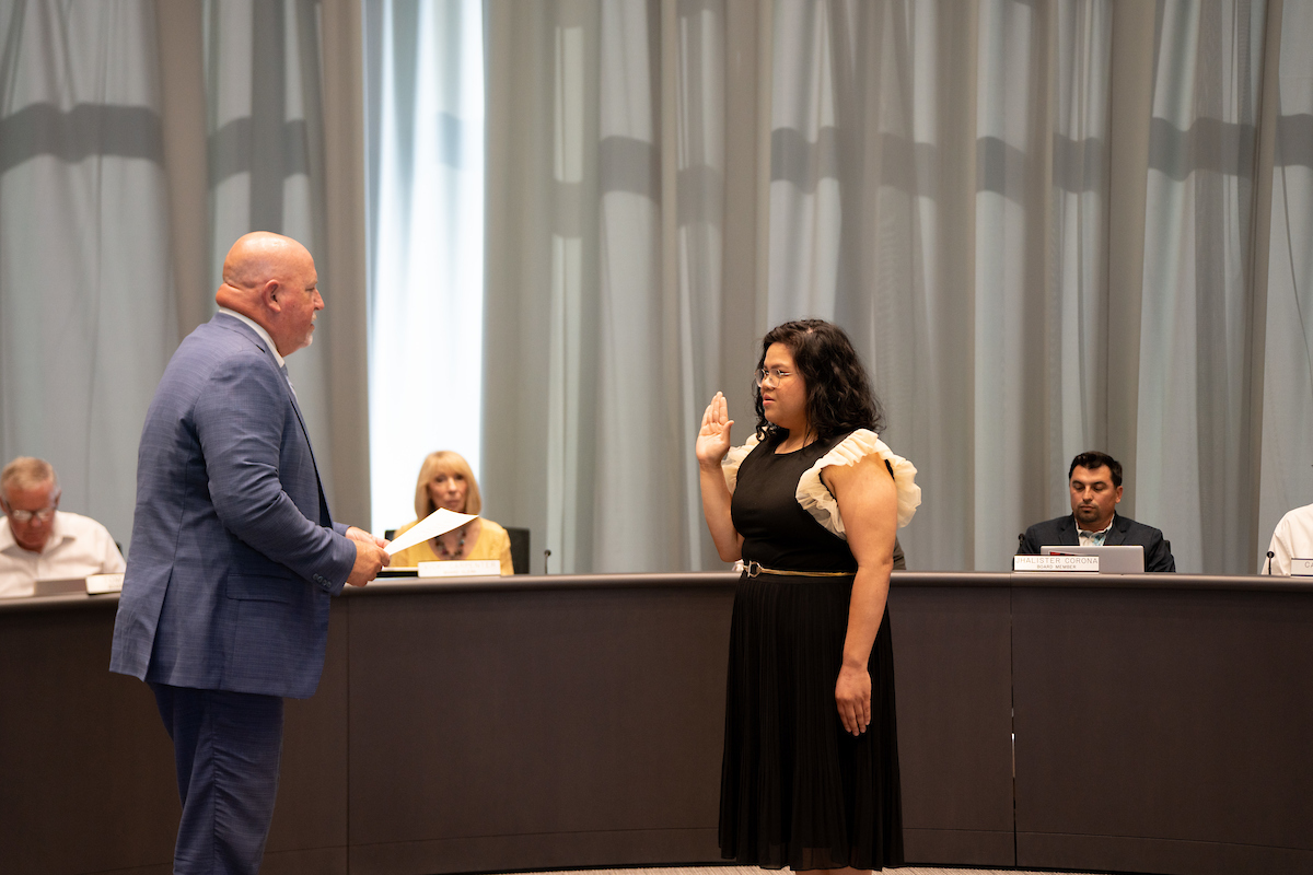 Dr. Roger Schultz administers the Oath of Office