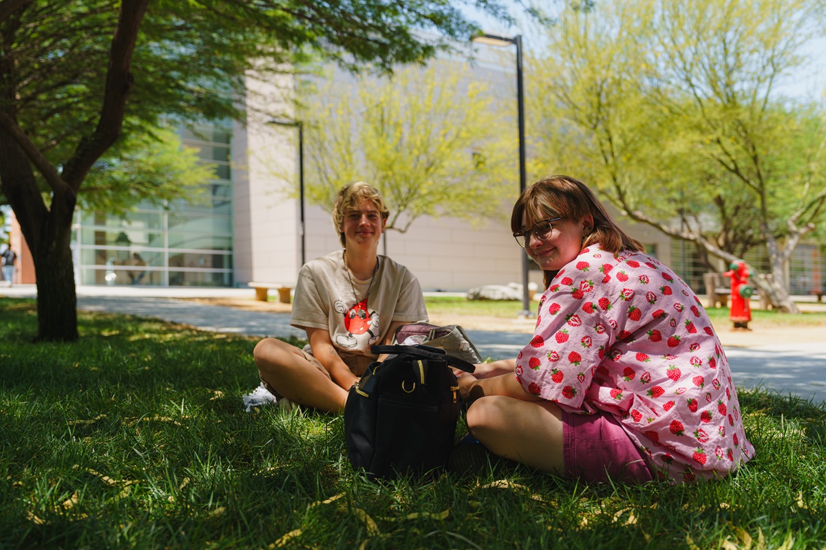 students in the shade