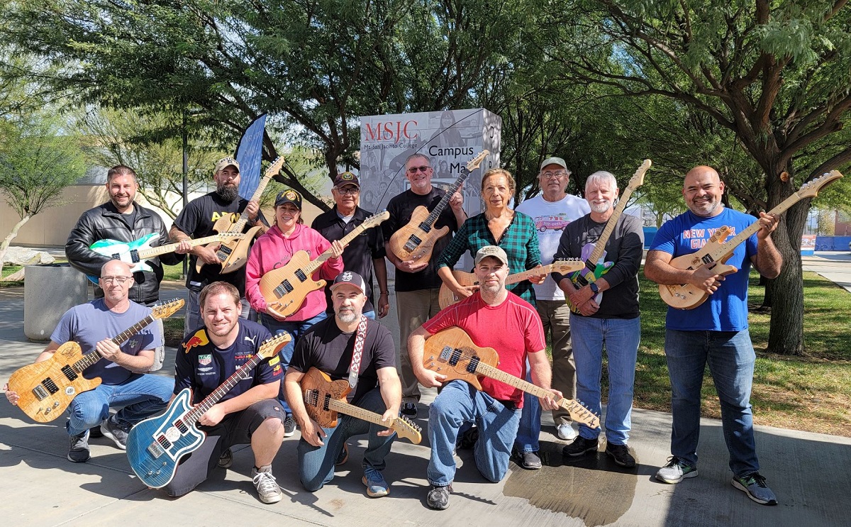 group photo with guitars
