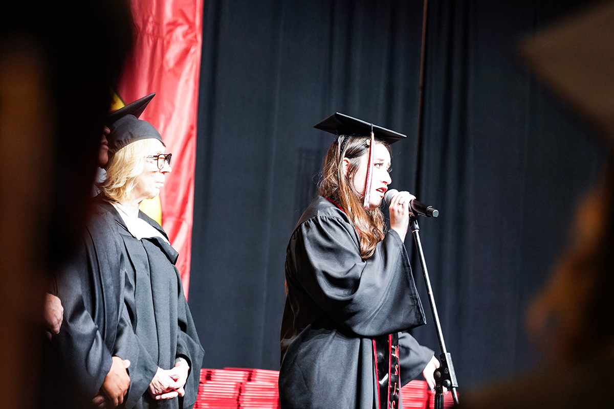 MSJC graduate Salma Paredes Osuna singing the national anthem