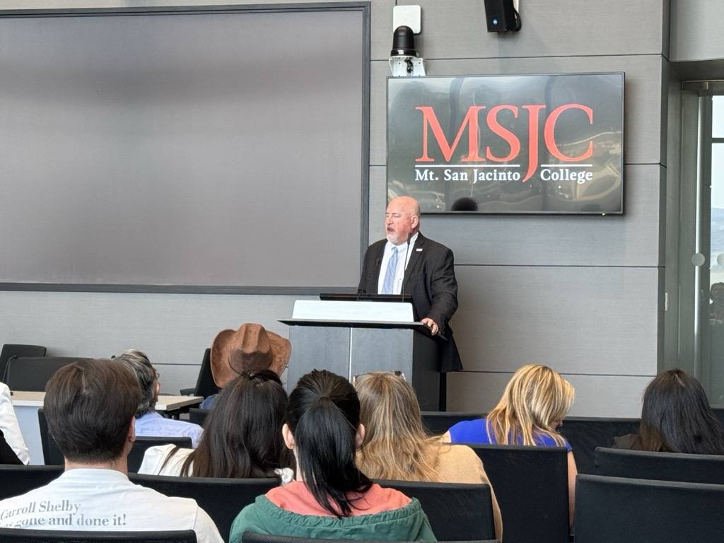 Dr. Roger Schultz at the podium