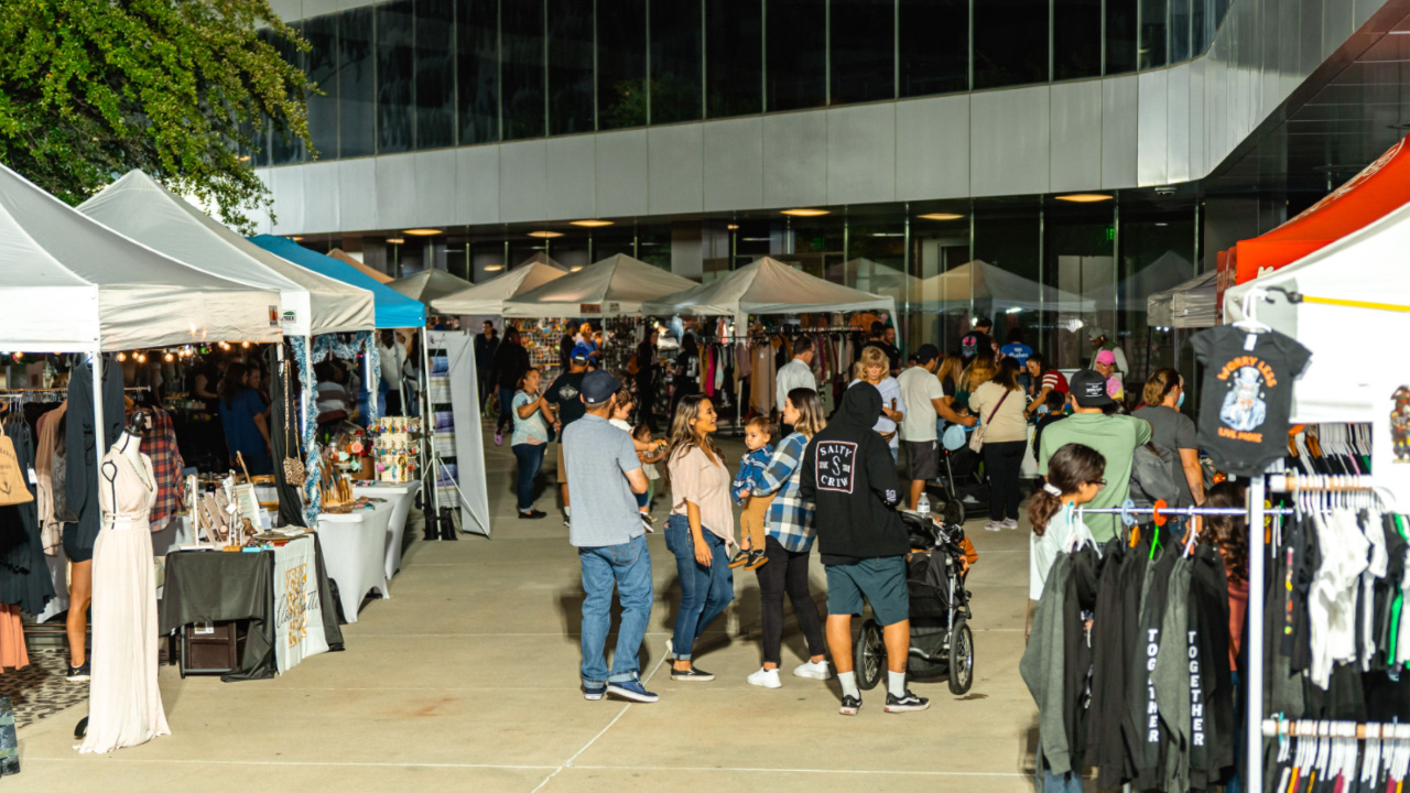 shoppers explore vendor booths