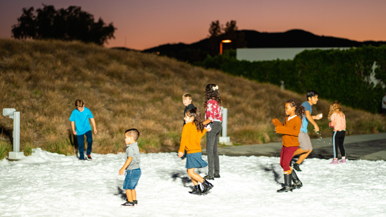 kids playing in the snow