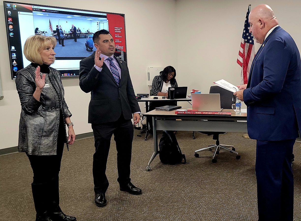 Trustees Carpenter and Corona take the Oath of Office