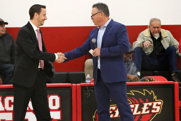 Coaches Skinner and Springer shake hands