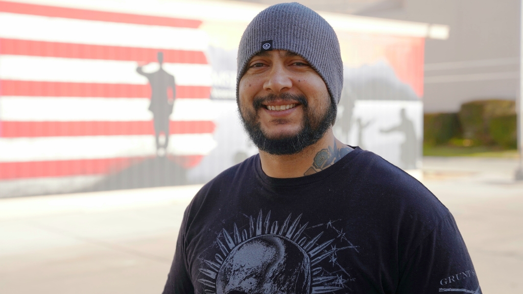MSJC student Adrian Ledesma stands in front of the Veterans Resource Center
