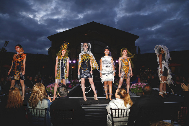 models in front of electricly charged sky